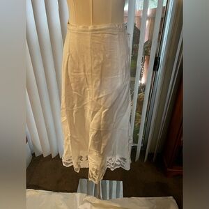 Lane Bryant White plus size 18/20 skirt w/lace detail at bottom.